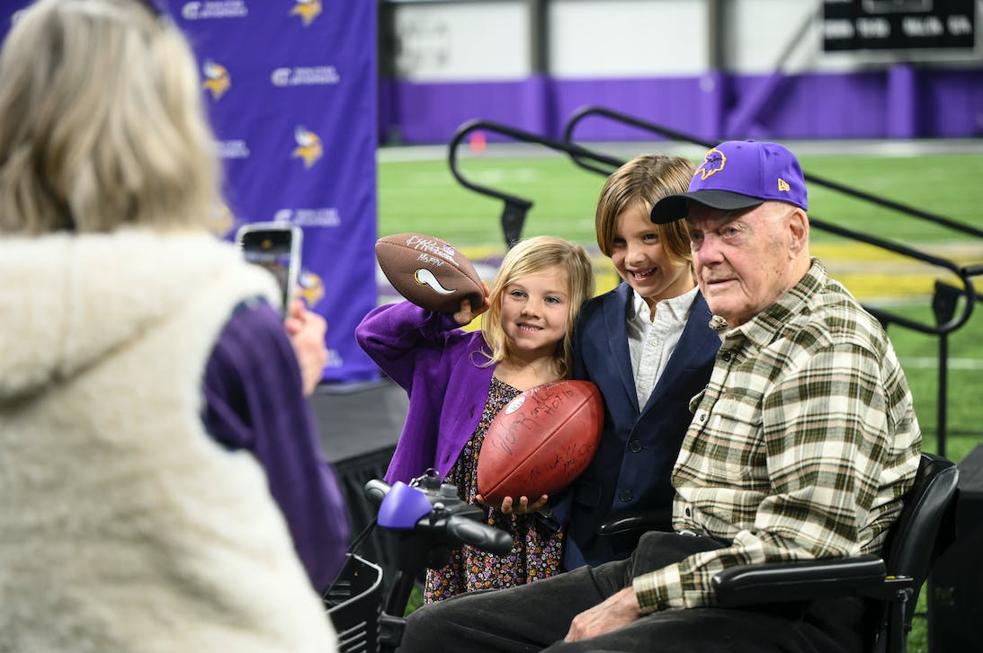 AARON LAVINSKY, STAR TRIBUNE
Bud Grant posed with Kevin O'Connell's children after his introductory press conference last year.